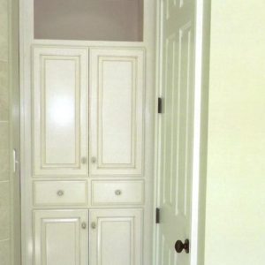 Custom White Stained Linen Cabinet